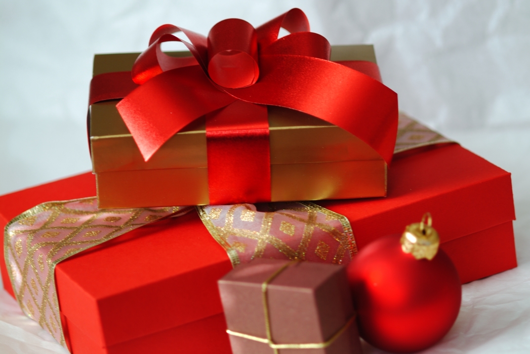 Christmas Presents Gifts Wrapped in Red Ribbon