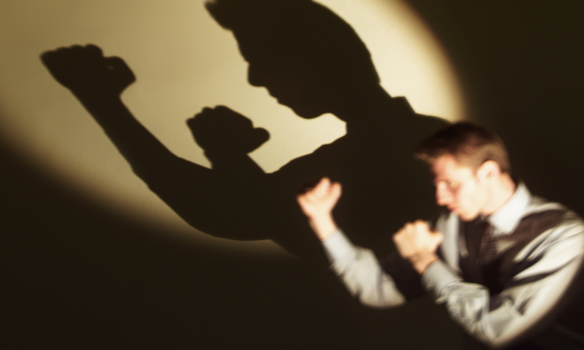Fighting Businessman with Shadow