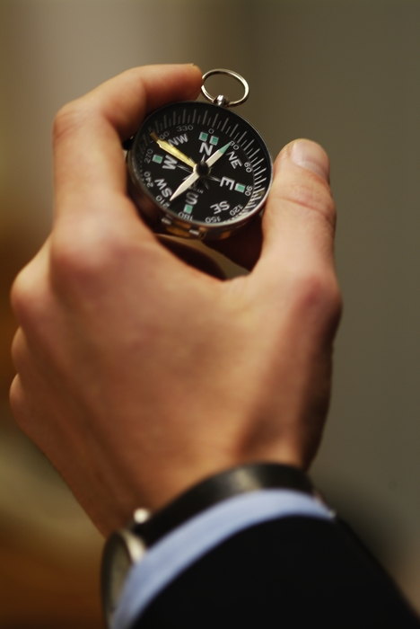 Hand with Navigational Compass