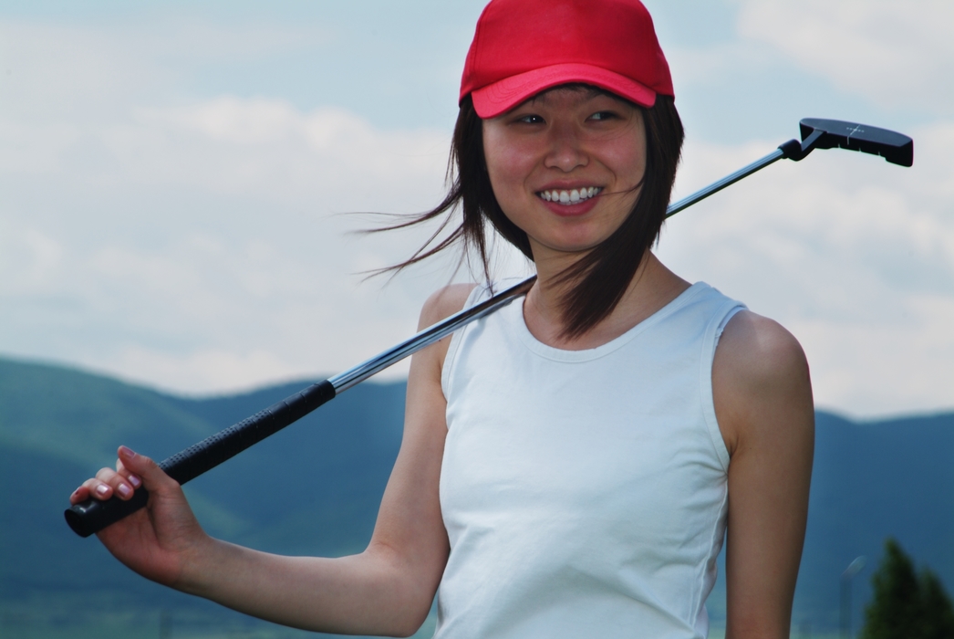 Female Golfer with Putter