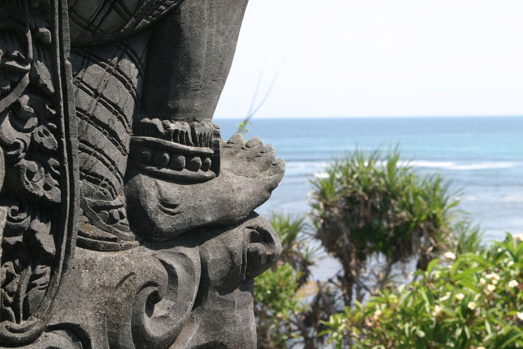 Hindu Statue with Ocean Backdrop