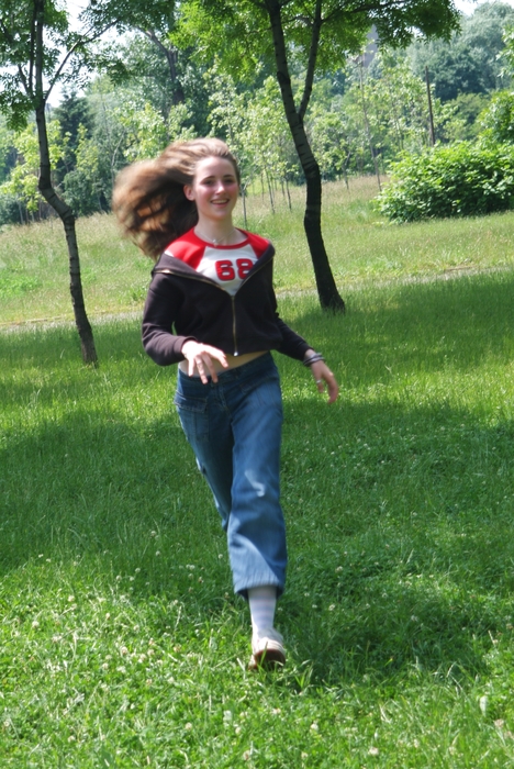 Girl Running in the Park