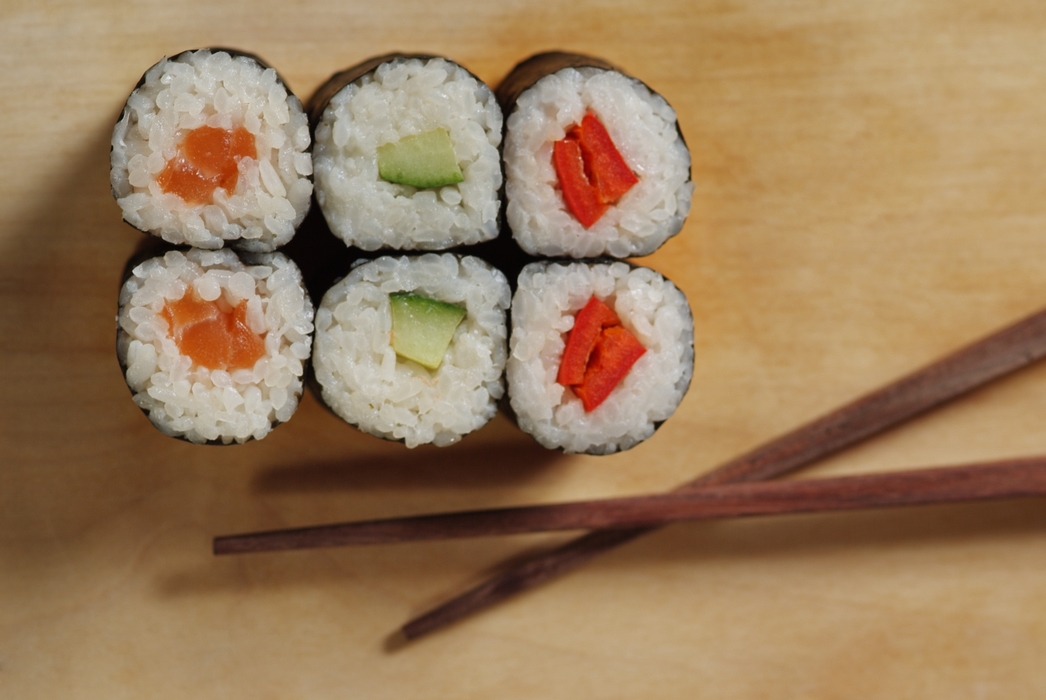 Salmon Sake, Cucumber, and Red Pepper Sushi with Chopsticks