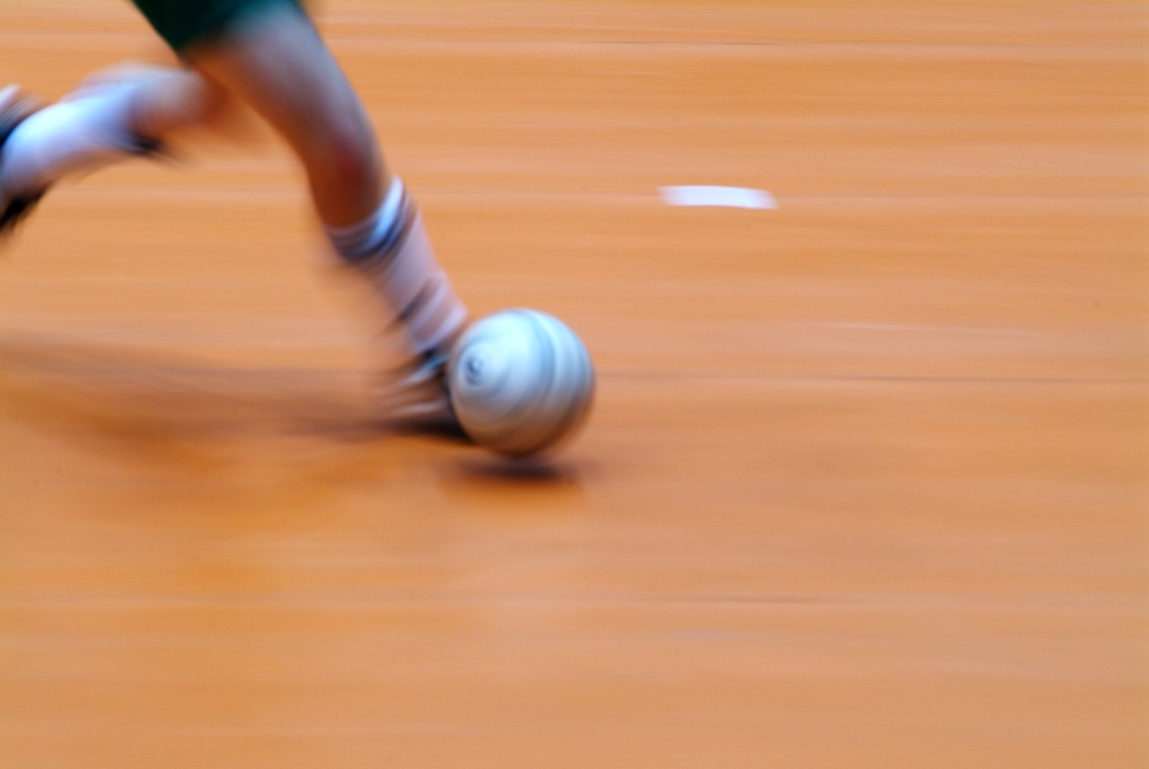 European Football: Soccer Player Runs with Ball