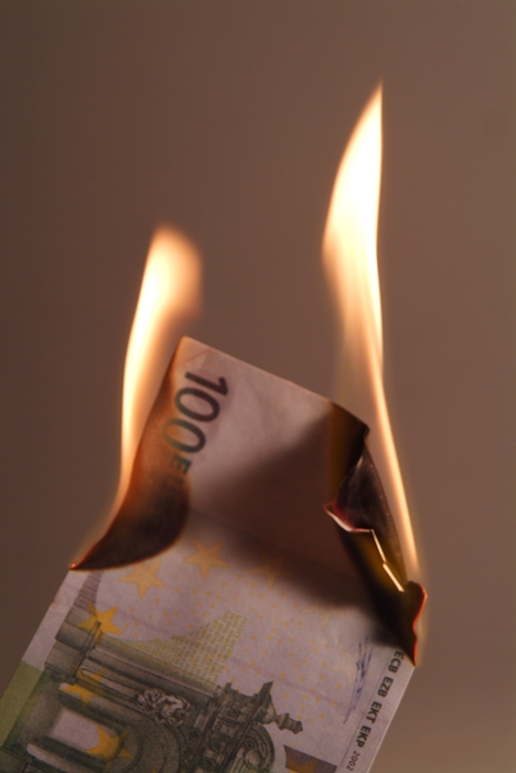 Burning 100 Euro Money Bill