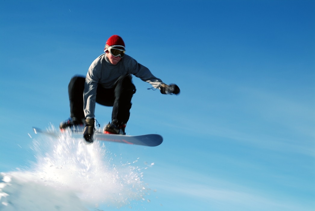 Snowboarder Makes the Jump and Catches Some Air