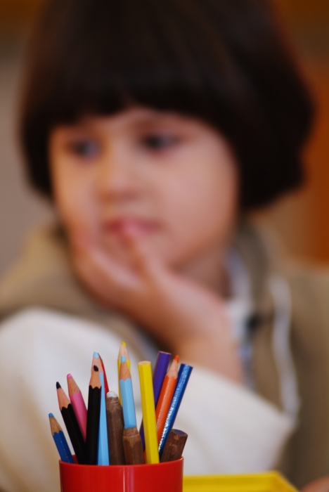 Young Girl with Colored Pencils