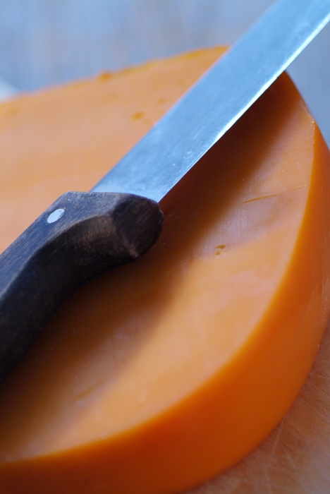 Fresh Cheddar Cheese with Knife