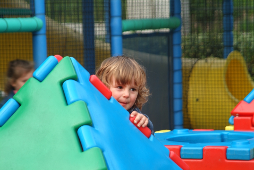 Boy Playing on Play Structure
