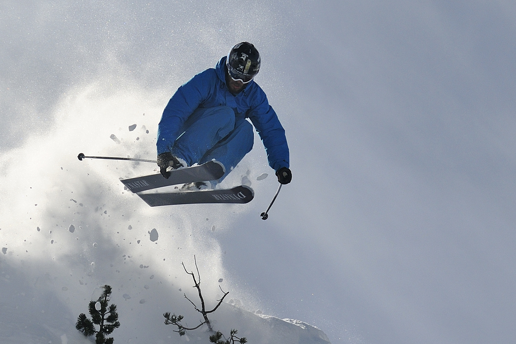 Skier Jumping in Air on slopes