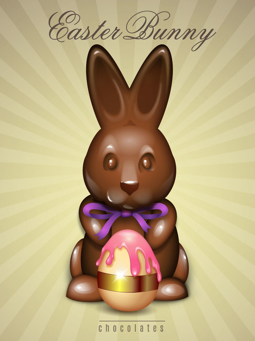 Chocolate Easter Bunny holding a candy egg